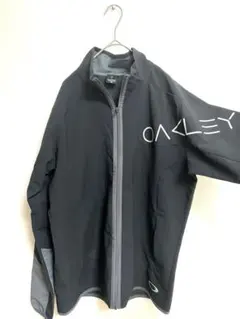 オークリーOAKLEYジャケットXLブラック メンズ スポーツウェアジップアップ