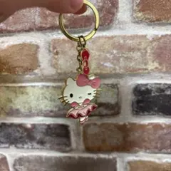 ご当地キティ】USJ限定 赤ドレスキティ 根付 ストラップ - メルカリ