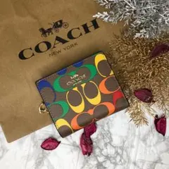 COACH コーチ 二つ折り財布 ベージュ シグネチャー レインボー カラフル