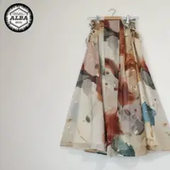 フレアスカート　アートデザイン　レースアップ　透け感　ロング丈　ガーリー　金