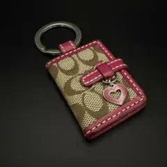 コーチ 手帳型 キーリング キーホルダー ピンク シグネチャー ソーホー
