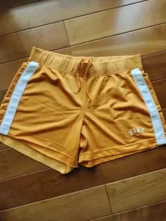 NIKE オレンジショートパンツ サイドストライプ