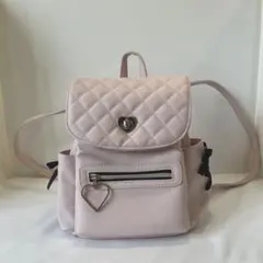 キッズ☆ 小さめリュック　ピンク色　ハートチャーム　黒リボン