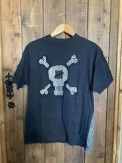 STUSSY × UNDEFEATED ストゥーシー　アンディフィーテッド