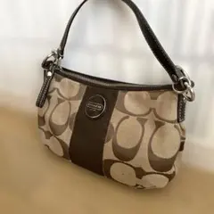 COACH ロゴ入りブラウンハンドバッグ