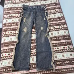 ブーツカットデニム　フリンジ加工ウエスタン風