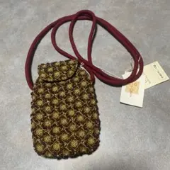 スマホショルダーバッグ 装飾的な模様