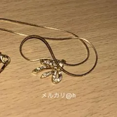 ネックレス ゴールド リボン