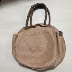 ベージュ 円形 かごバッグ