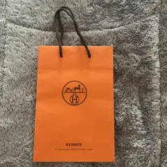 HERMES オレンジ ロゴ入り紙袋