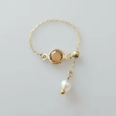 シャネルストーン チェーンリング　トパーズカラー　ゴールド