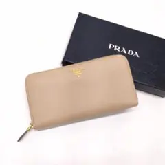 PRADA サフィアーノ メタル ラウンドジップ 長財布 1ML506 ベージュ