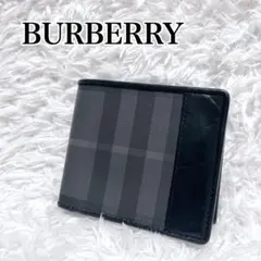 美品✨BURBERRY バーバリー チェック PVC×本革 二つ折り財布　黒のサムネイル