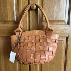 ロビタ 黒のレザー編み込みかごバッグ robita ロビタ レザー編み込みかごバッグ - メルカリ