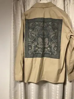 TheEndlessSummer XL ベージュ 長袖シャツ バックプリント