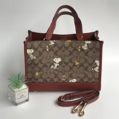 新品 COACH コーチ スヌーピー トートバッグ デンプシー キャリーオール