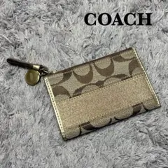 COACH コーチ シグネチャー キャンバス フラグメントケース ゴールド