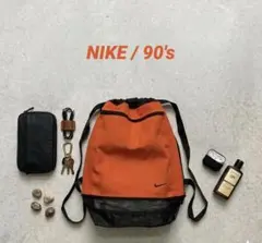 NIKE 90sオレンジ　ナップサック　archive古着　y2k 刺繍 差し色