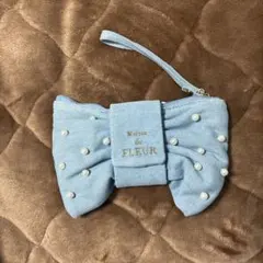 新品未使用】Maison de FLEURのリボン型ポーチ クラッチ - メルカリ