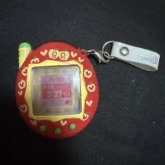 たまごっちプラス 赤いシリーズ　りんごれっど　赤たま　動作確認済み　ストラップ付のサムネイル