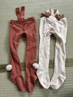 赤色と白色のベビータイツ2点セット