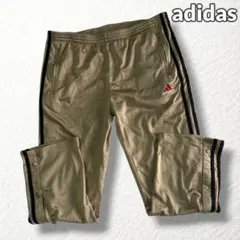 希少【アディダス】サイドボタントラックパンツ 万国旗タグ ゴールド系 M~L相当のサムネイル