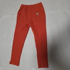 オレンジ色リブ編みロングパンツ 110