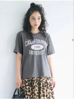 coca アソートデザイン クルーネックTシャツ カレッジロゴのサムネイル