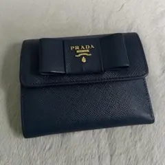 PRADA プラダ　折り財布　リボン　ゴールドロゴ ブルー　サフィアーノレザー