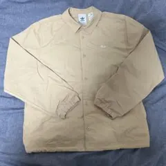 アディダスオリジナルスADIDAS COACHSHIRTコーチシャツベージュ