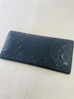 O コーチ シグネチャー エンボス 折り長財布