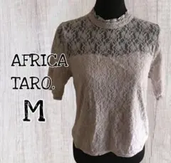AFRICATARO. トップス 半袖ブラウス ハイネック Mサイズ/USEDのサムネイル