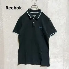 Reebok 綿100% ポロシャツ M 黒 青ライン 爽やか 刺繍ロゴ 希少のサムネイル