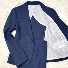 【美品】ウィズパフォーマンス 7号 パンツスーツ ネイビー　ストライプ