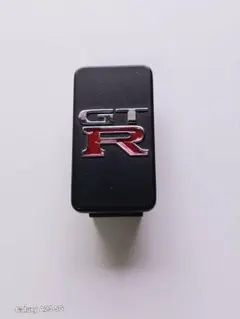 完全未使用品です。 日産スカイラインGT-R 黒 スイッチホールパーツのサムネイル