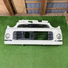 ムーヴ カスタム LA100S 前期 フロントバンパー 52119-B2A10 ムーヴ カスタム LA100S 前期 純正フロントバンパー52119-B2A10 - メルカリ