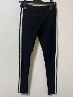 CRYX 黒のストレッチラインパンツ