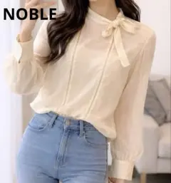 【新品タグ付き】NOBLE ハシゴレースシアーボウタイブラウス　訳ありのサムネイル