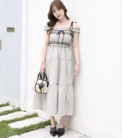 ナイスクラップ 背中あき配色リボンシャーリングロングワンピ | Mercari