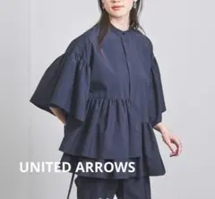 UNITED ARROWS イレギュラーペプラムブラウス 38サイズのサムネイル