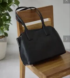 ear PAPILLONNER(イア パピヨネ) スタッズ仕切りトートバッグ