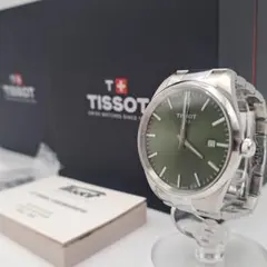 美品 TISSOT ティソ PR100 クォーツ 黒文字盤 全コマ付き - メルカリ