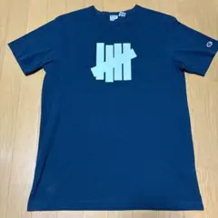 Undefeated Champion ネイビー Tシャツ X-LARGE