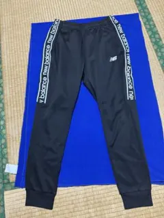New Balance JMPP8603 トラックパンツ ブラック サイズMのサムネイル