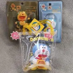ドラえもん『ピカピカ光るホルダー』ドリンク用と携帯用の2点＋ポーチinぬいぐるみ