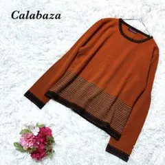 カラバサ 長袖ニット セーター オレンジ クルーネック 個性的 カジュアル