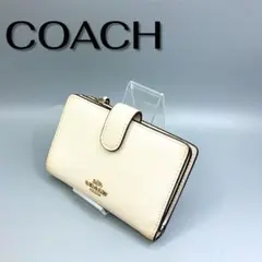 COACH コーチ 2つ折り 財布 ロゴ金具 レザー アイボリー　白　ホワイト