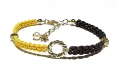 黄色と黒の雪の結晶付きブレスレット
