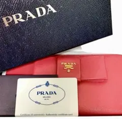 極美品　PRADA プラダ　ラウンドファスナー　サフィアーノ　リボン　ピンク