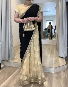 Elegant gold ×black sari